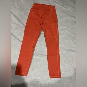Orange Rise Leggings with Pockets. Born primitive. Great condition.